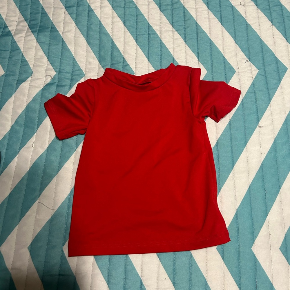Boy’s red swim shirt